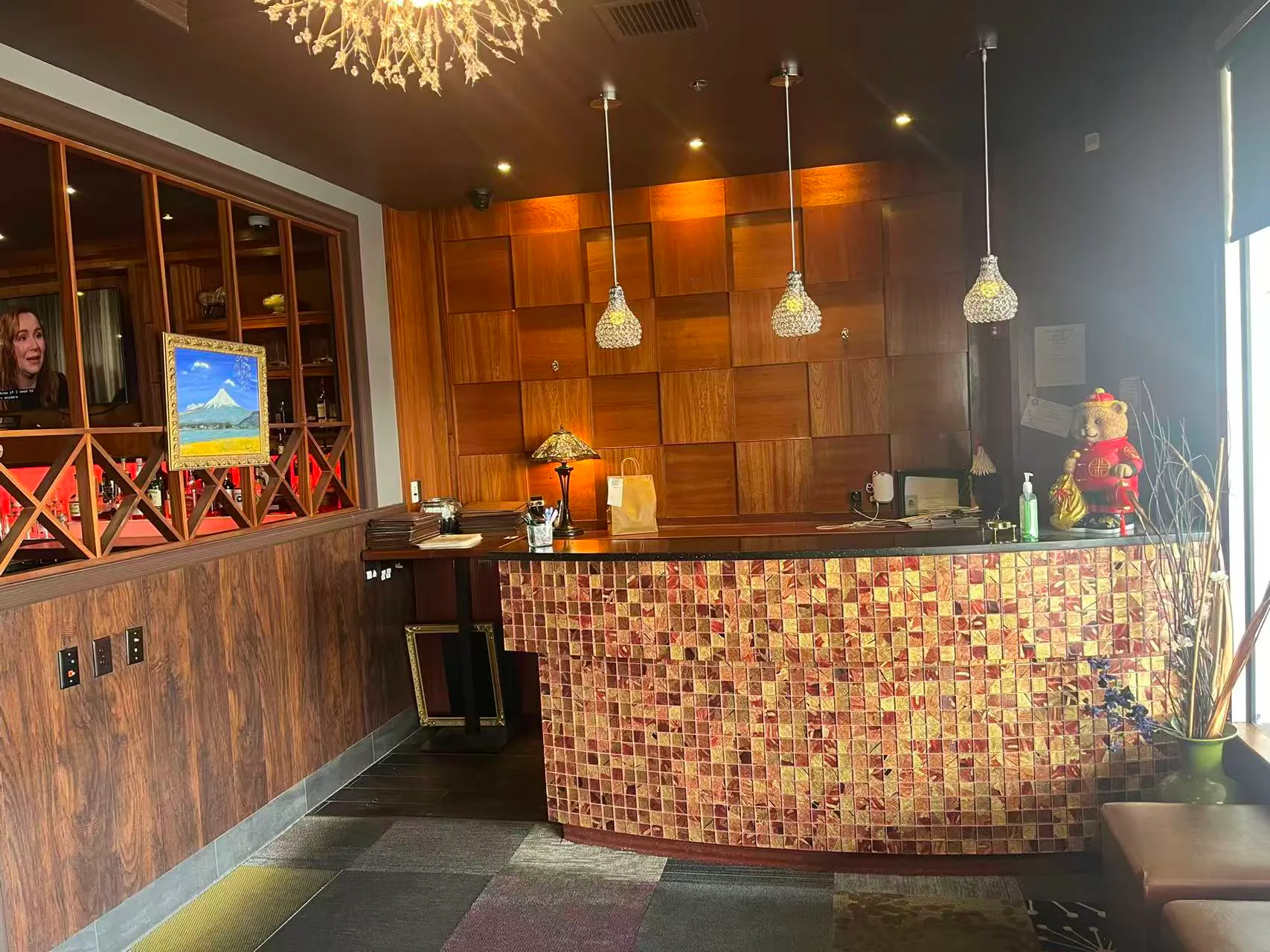 Reception desk with mosaic decor at AJ Hibachi Steakhouse, an Asian Restaurant in Cheshire